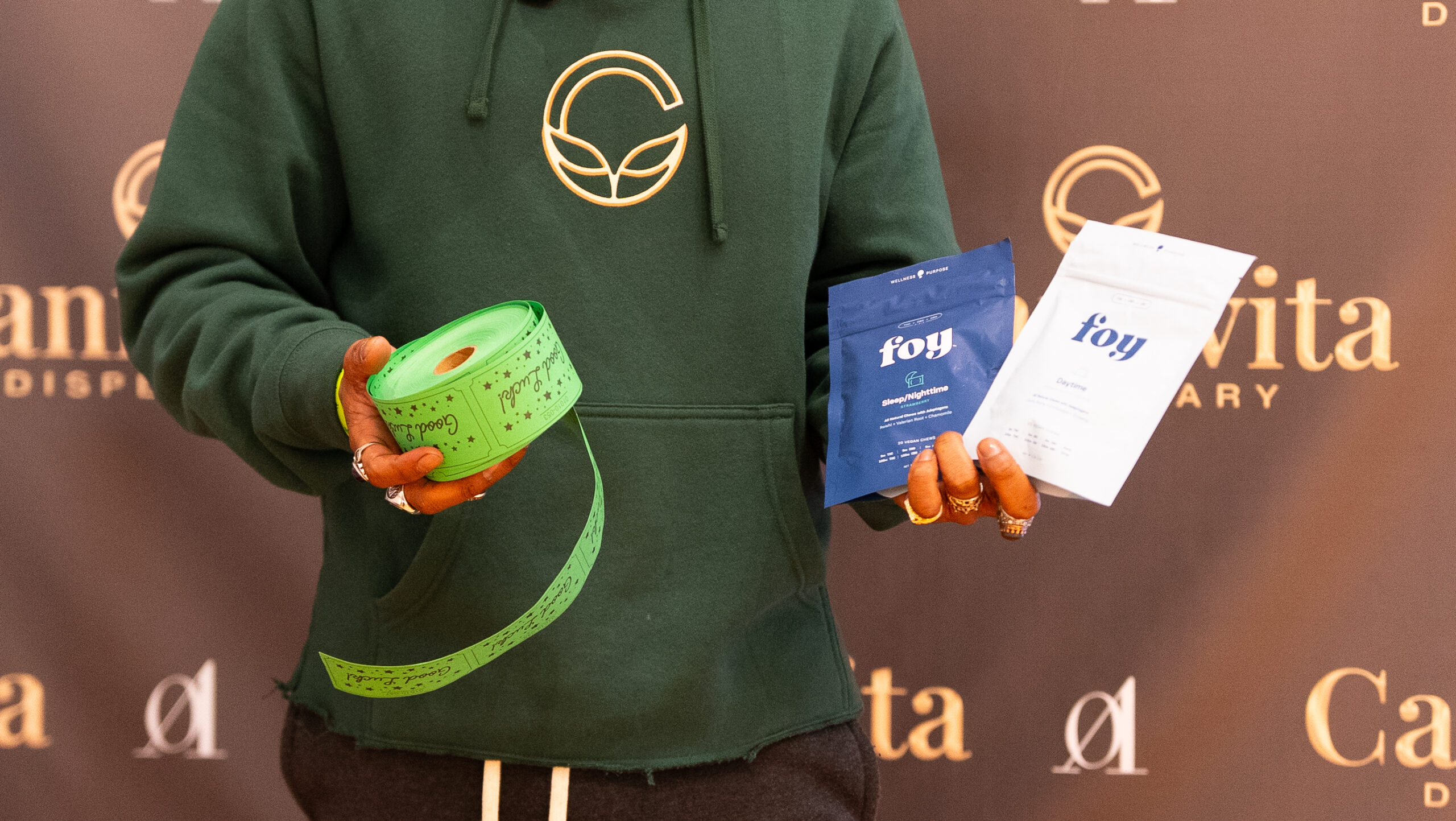 guy at cannavita holdig tickets for giveaway