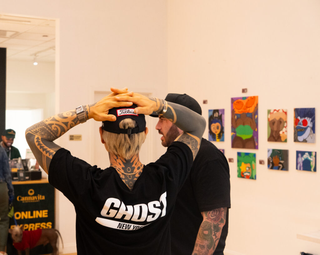 Customer exploring Ghost cannabis products at Cannavita dispensary in Astoria Queens.